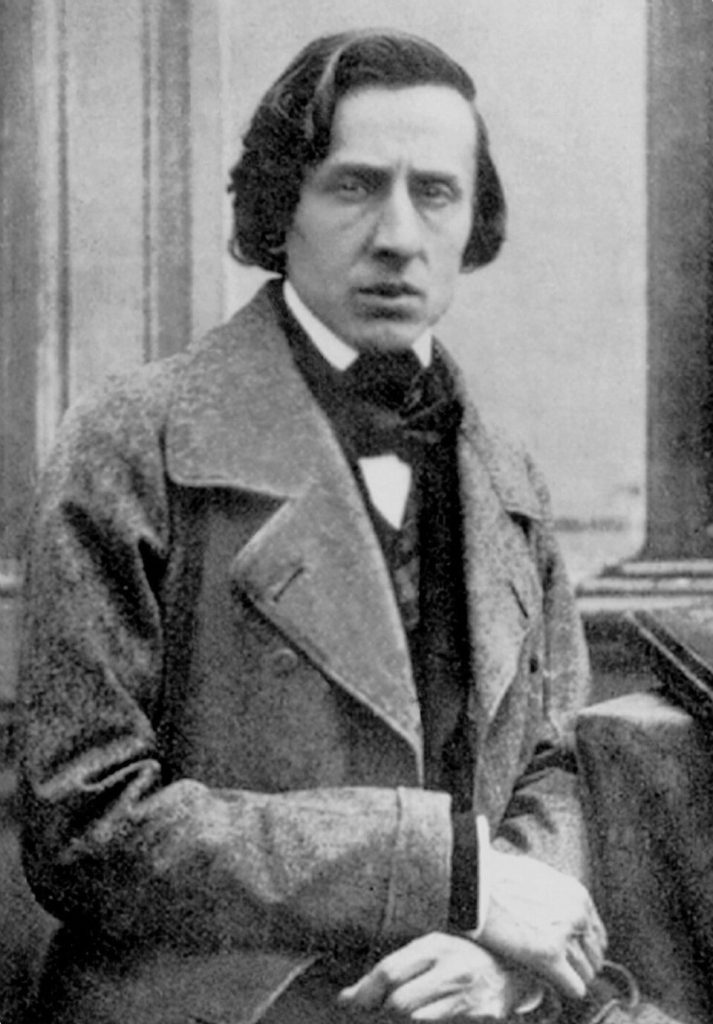 Historic portrait of Frederic Chopin in a coat and cravat, early photograph, looking directly at the camera.